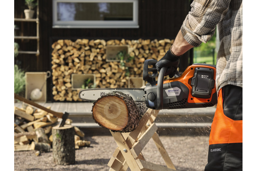 Husqvarna 242i chainsaw with battery and charger